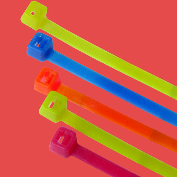 High-visibility fluorescent coloured cable ties in vibrant neon colours for easy identification and safety marking in low-light environments